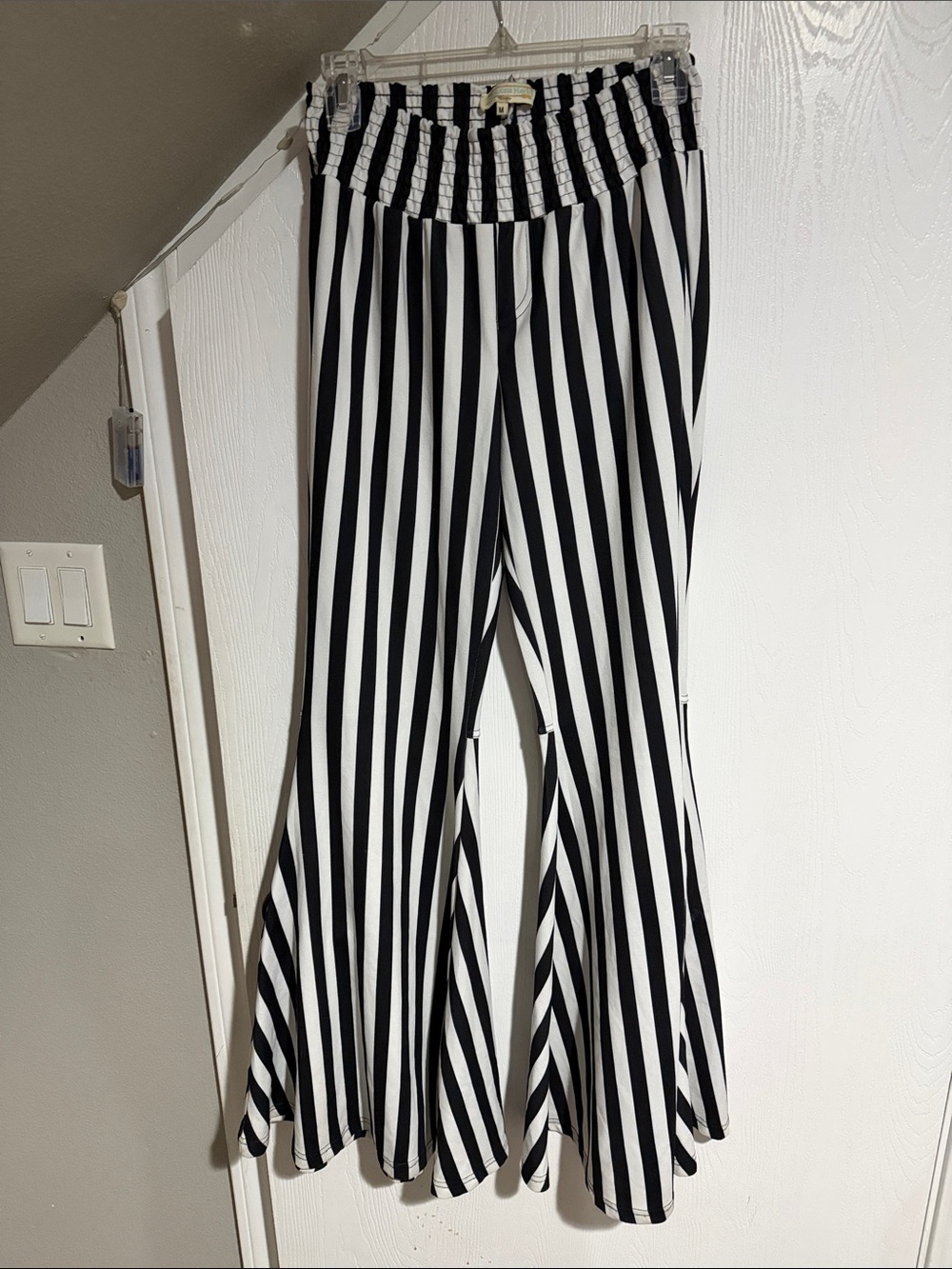 Turquoise haven Black & White Striped Flared Pants - Women